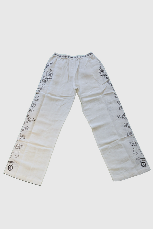 Pantalone in lino bianco ricamato