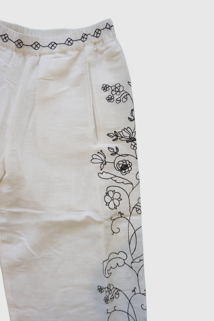 Pantalone in lino bianco ricamato